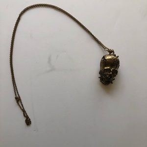 •EarthBound • gold Skull necklace
